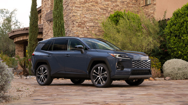 Front 3/4 view of a blue 2026 Toyota RAV4.