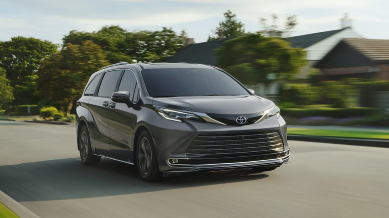 Front 3/4 view of a gray 2026 Toyota Sienna in motion.