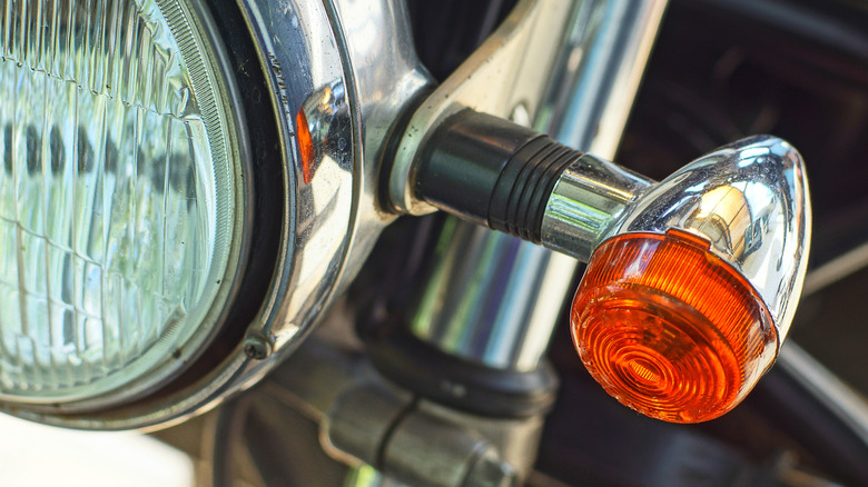 Plastic chrome light surround on a motorcycle
