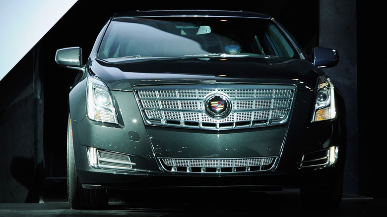 Front shot of a green 2013 Cadillac XTS