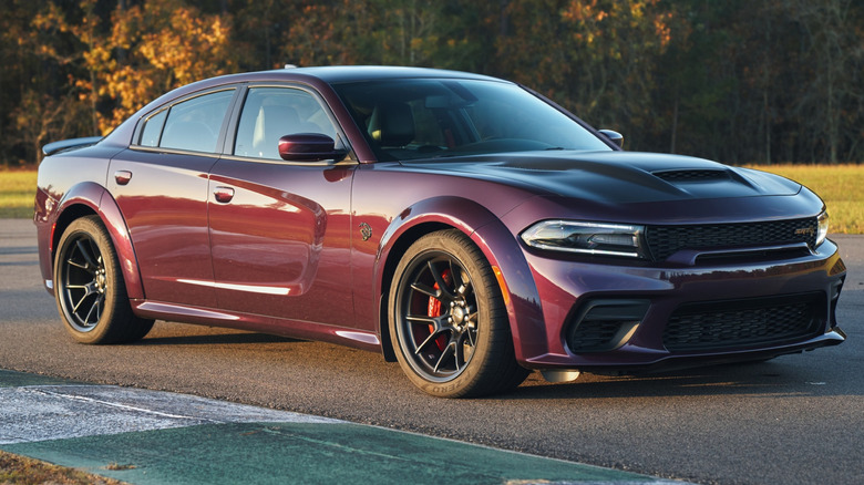 2021 Dodge Charger SRT Hellcat Widebody parked on a paved surface with trees in the background