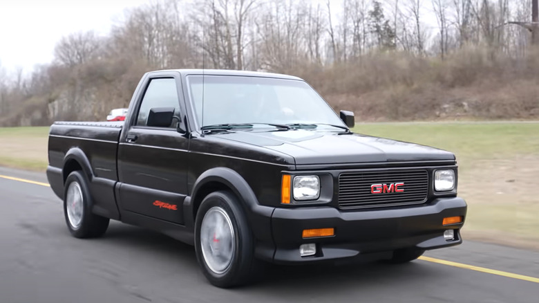Front-quarter shot of a GMC Syclone on the road