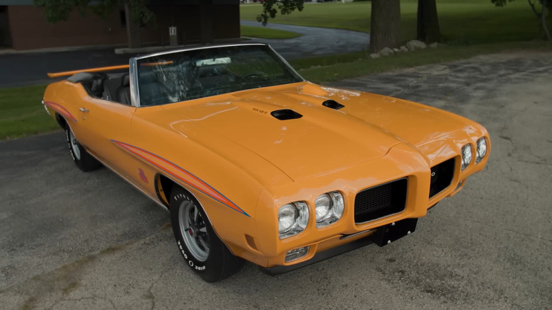 A yellow 1970 Pontiac GTO Judge Ram Air IV Convertible