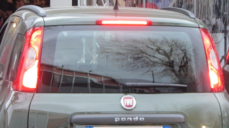 A glowing third high-mounted brake light in a Fiat Panda