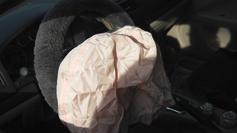A deployed airbag after a car accident