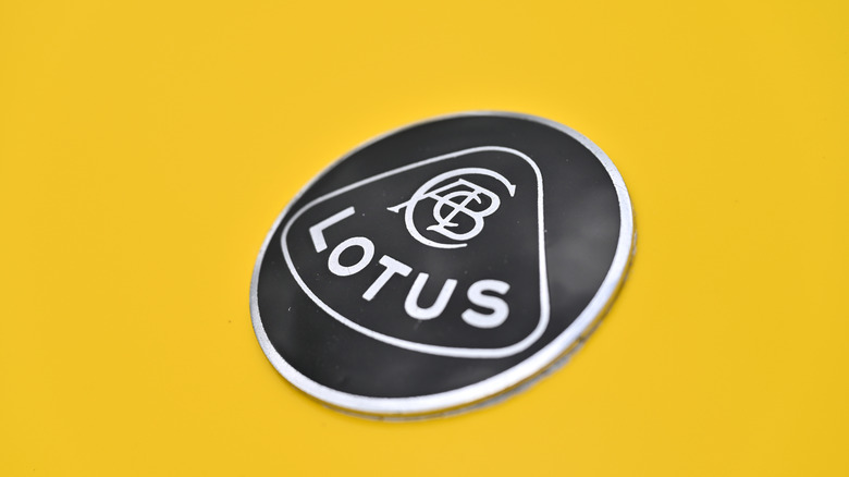A Lotus hood badge