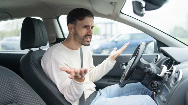 A driver frustrated at his car