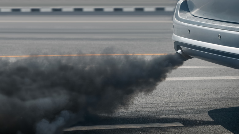 Black smoke pouring from a car's exhaust