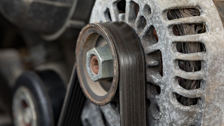 Worn serpentine belt on alternator pulley