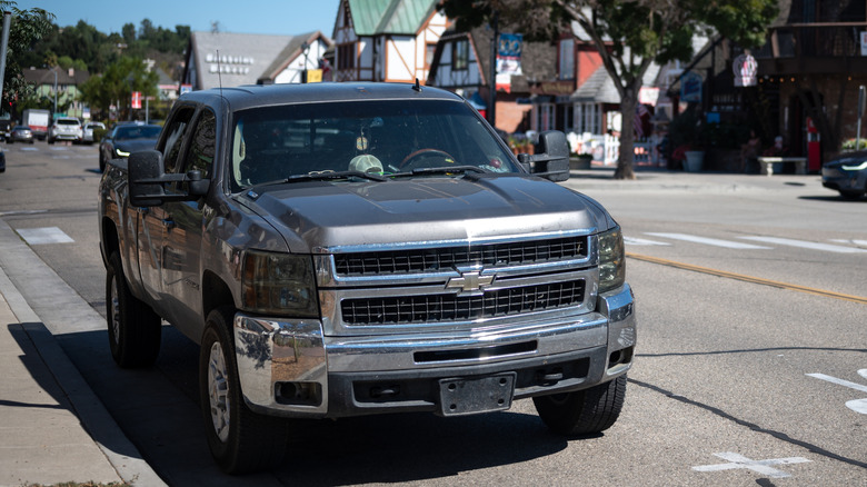 Gray GMT900 Silverado parked at the roadside