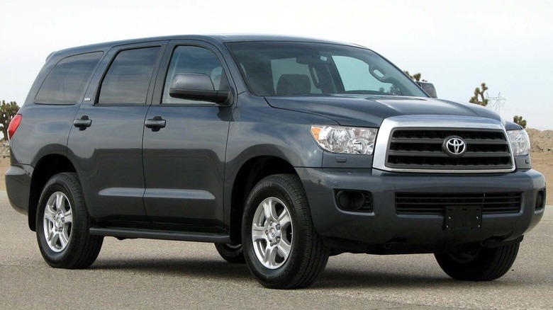 A gray Toyota Sequoia on pavement.