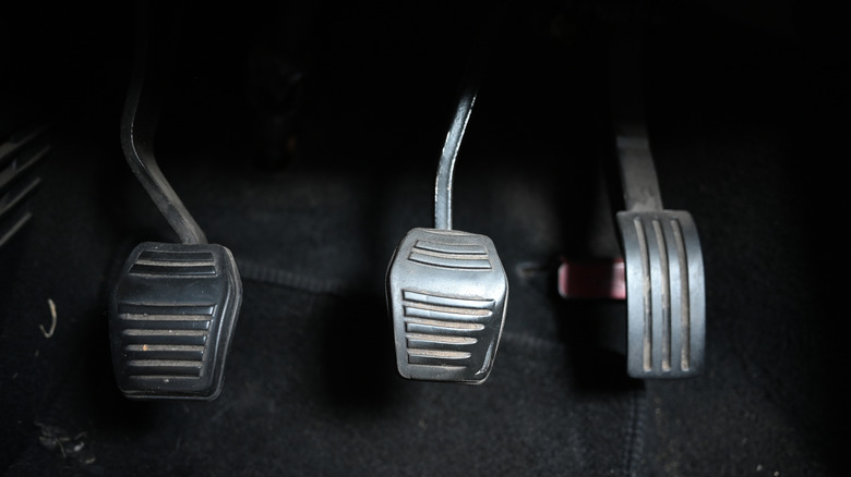 Three pedals in a manual transmission car.