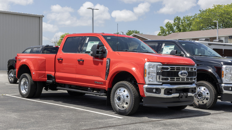 A Ford Super Duty work truck in a parking lot