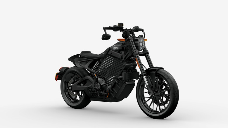 A blacked-out LiveWire S2 Mulholland electric motorcycle sits in a white studio.