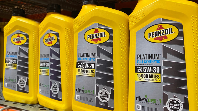 Containers of Pennzoil Platinum on a shelf