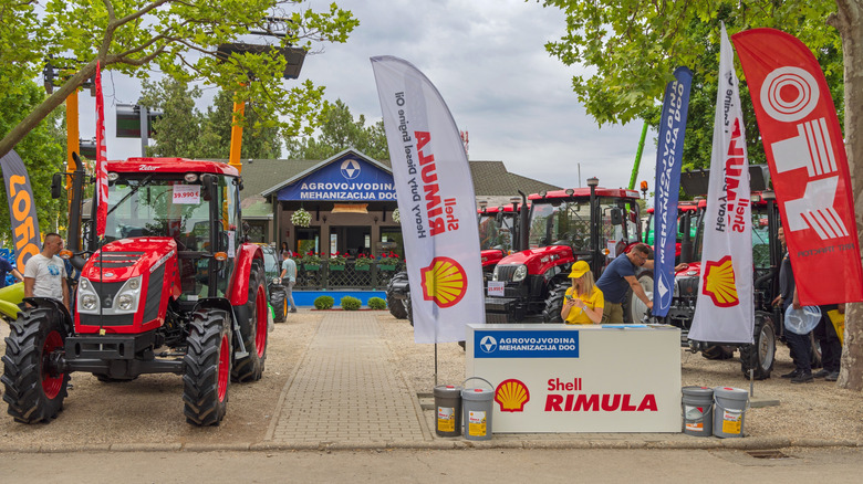 Shell Rimula outdoor trade booth in Serbia with red tractor