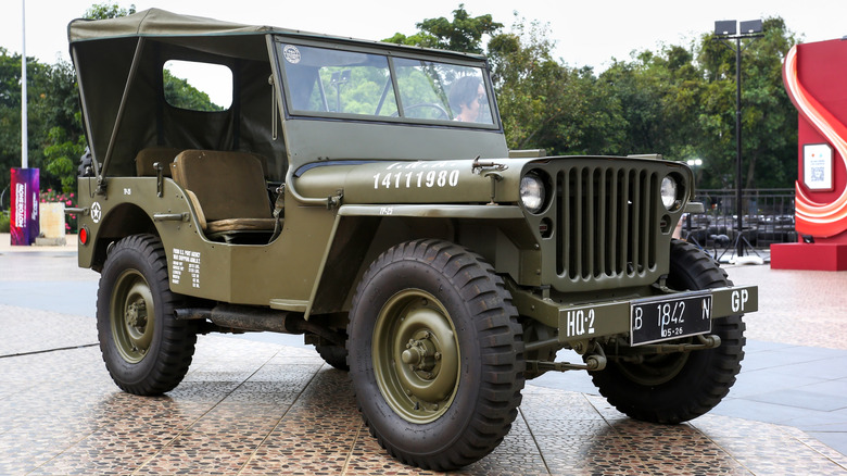 A Willys MB Jeep exhibited in a public space.