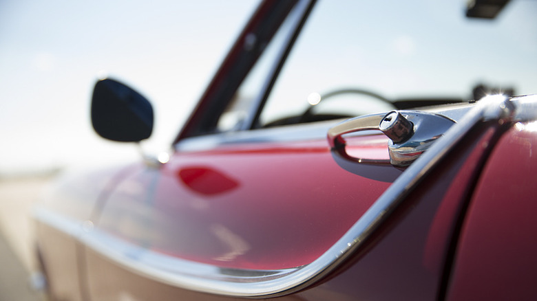 A close-up side view of Irv Gordon's Volvo P1800