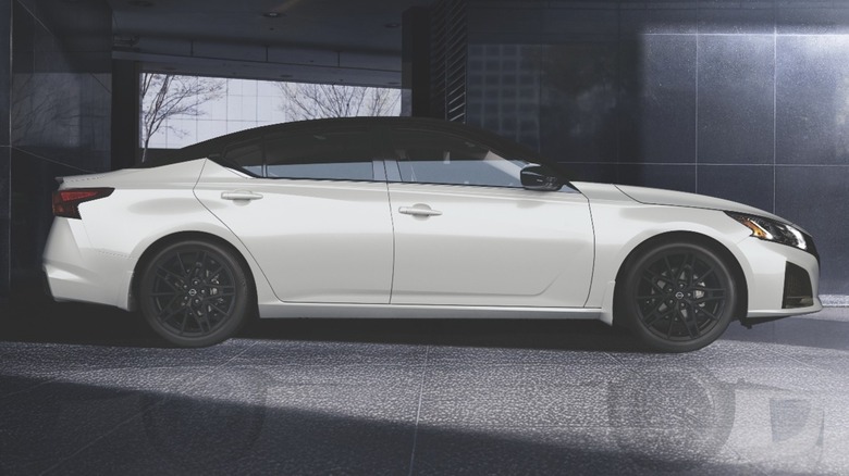 A white 2026 Nissan Altima in front of a building