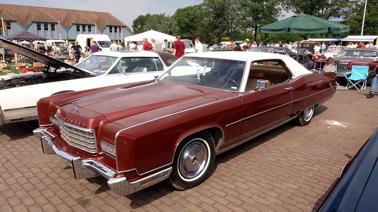 Front-quarter shot of a brown and white 1973 Lincoln Continental