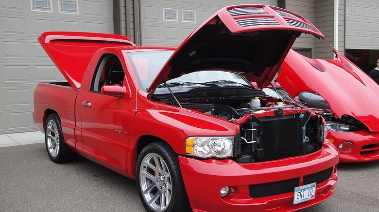 Front-quarter shot of a Dodge Ram SRT-10 with hood and bed-cover open