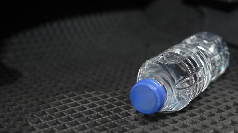Plastic wattle bottle in a car.