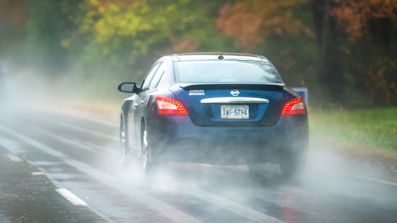Nissan Maxima on a country road