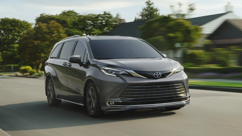 A front 3/4 view of a gray 2026 Toyota Sienna in motion.