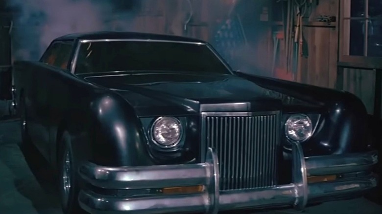 A modded black Lincoln Continental Mark III from "The Car"