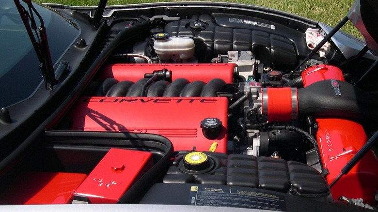 An LS6 V8 engine under the hood of a Corvette C5 Z06