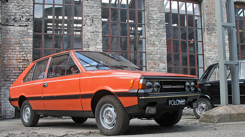 Vintage FSO Polonez parked in front of a building.