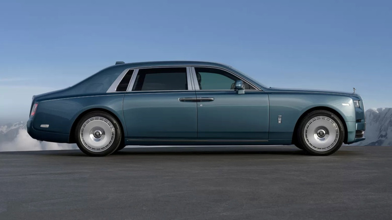 A side view of a teal Rolls-Royce Phantom Extended