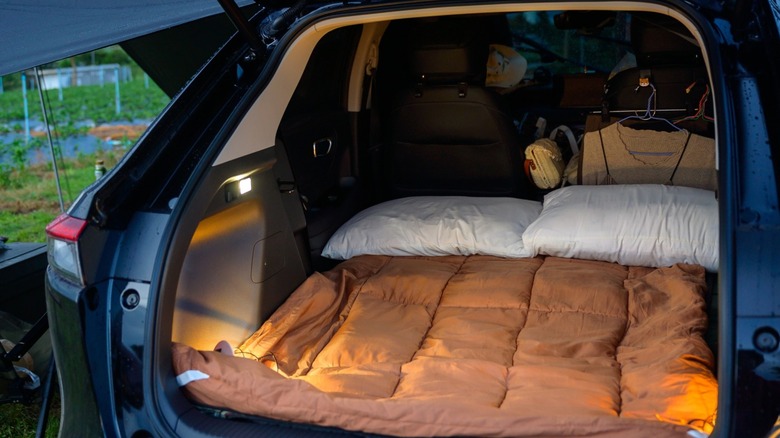 SUV with bedding for camping
