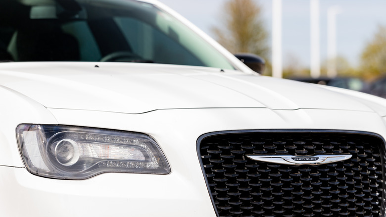 A close-up of a white Chrysler 300