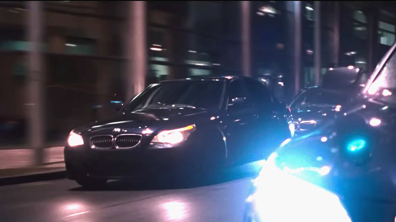 A still screenshot of the black M5s used in "Fast & Furious 6."