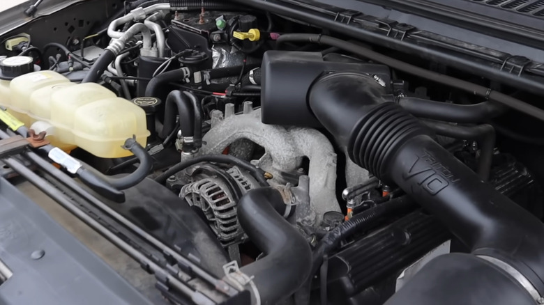 Ford's 6.8-liter Triton V10 engine under the hood of a 2003 Ford Excursion Limited