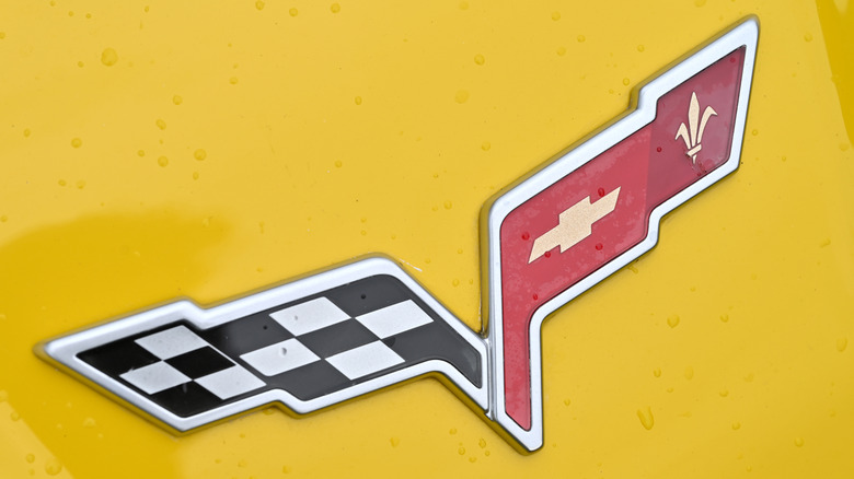 A Corvette logo is shown close-up.