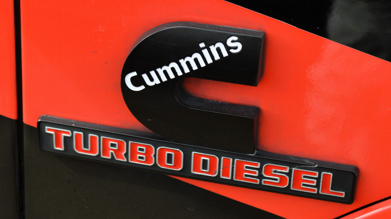 A red and black Cummins badging from Ram pickup truck