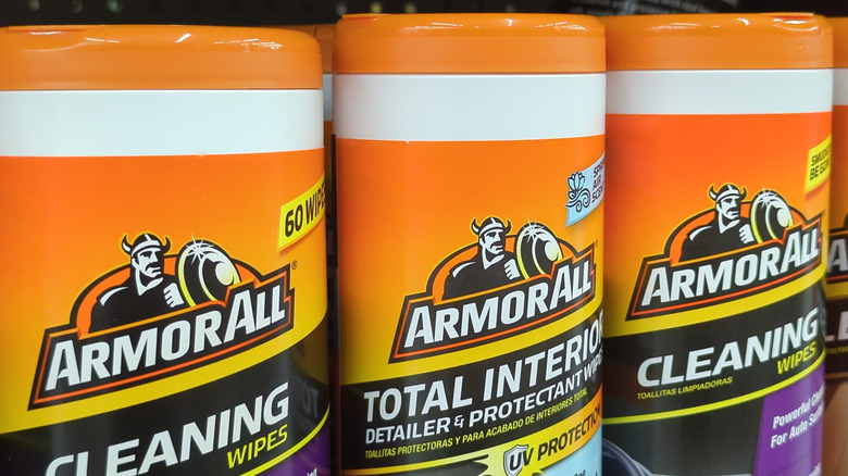 Orange ArmorAll products on display in a store.