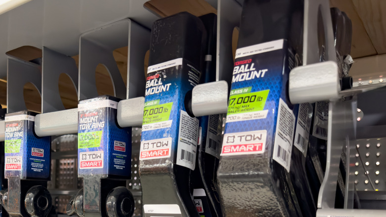 TowSmart hitch mounts on display in a store.