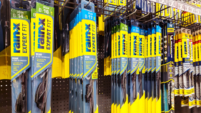 Rain-x windshield blades in various sizes on display in a store.