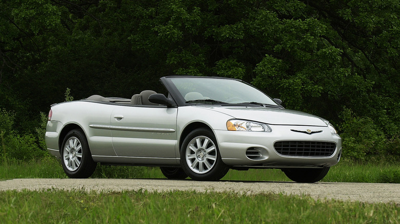 Three quarter image of a silver 2003 Chrysler Sebring Convertible.