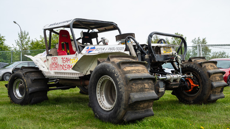 Close up image of an Icelandic Formula Offroad truck with paddled tires.