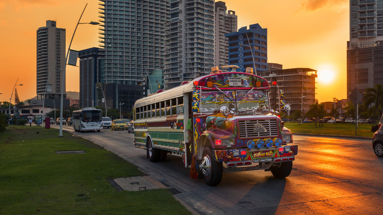 Sunset image of a Red Devil bus in Panama City.