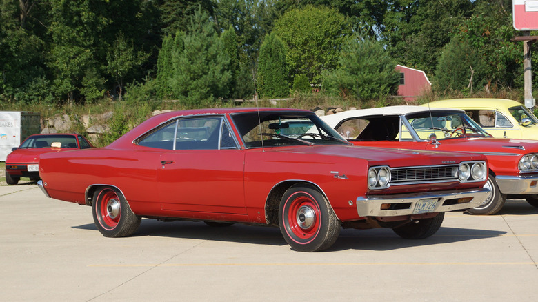 Three quarter view of a red 1968 Plymouth Sport Satellite.