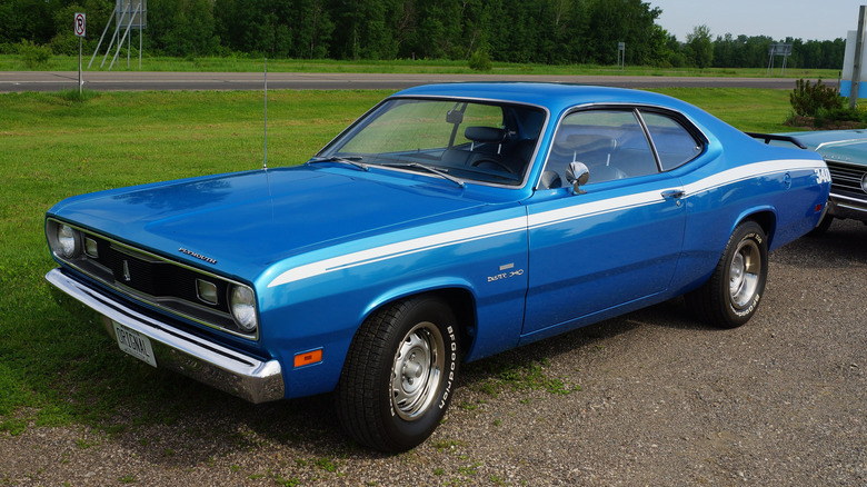 A blue 1970 Duster 340 at a car show.