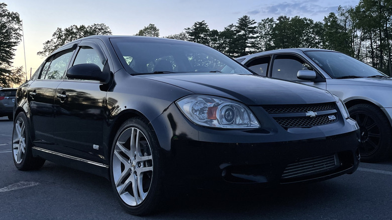 Black 2009 Chevrolet Cobalt SS sedan successful a parking lot