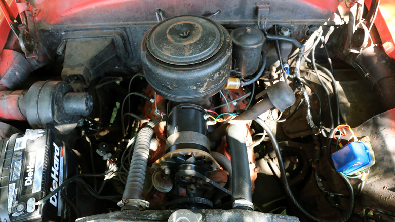 Closeup of a Ford V8-B3 flathead V8 engine in a 1953 Ford Crestline Sunliner.