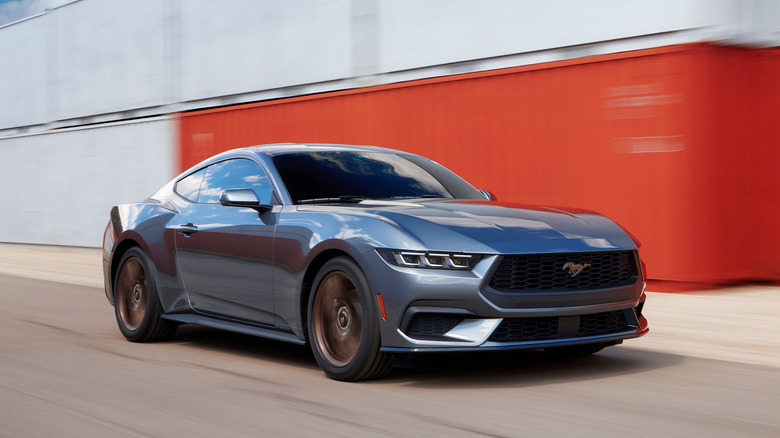 2024 Ford Mustang GT 5.0 front 3/4 view while driving