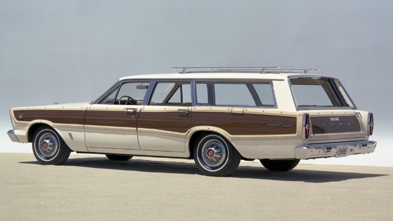Front three-quarter product image of 1966 Ford Country Squire Wagon.